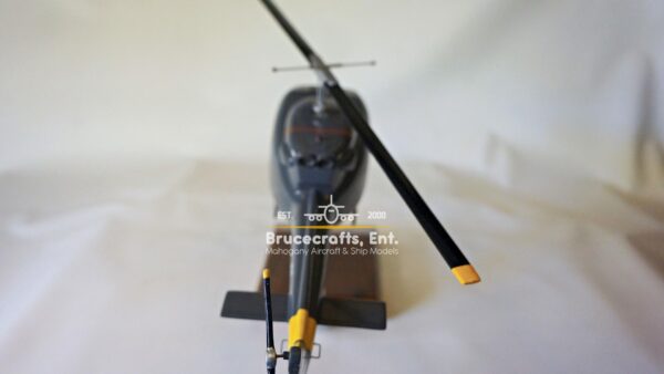 Model of UH-1N Twin Huey US NAVY 103 Aircraft with detailed craftsmanship.